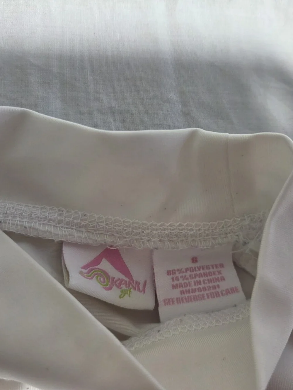 Kanu Surf White Kids Swim Top with Pink Logo